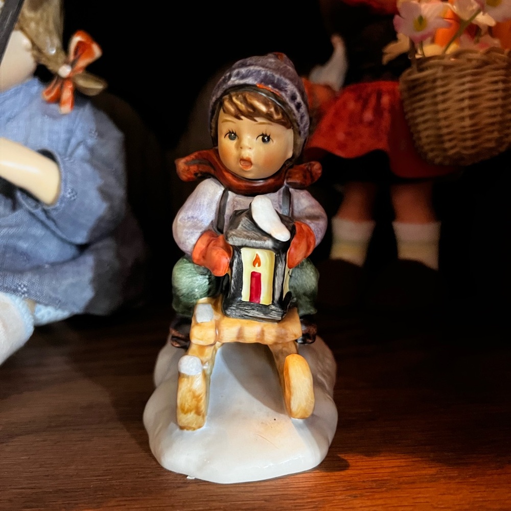 Hummel Ceramic Figurine with Red and Green Accents